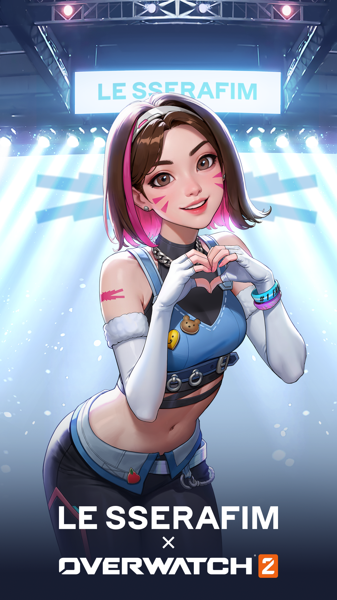 Overwatch 2 themed phone wallpaper featuring the animated character D.Va making a heart shape with her hands, with the text LE SSERAFIM x OVERWATCH 2 displayed at the bottom.