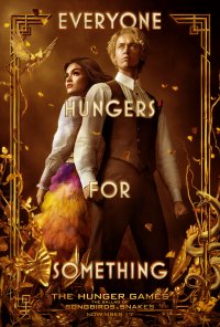Phone wallpaper featuring a promotional poster for The Hunger Games: The Ballad of Songbirds & Snakes, showing a male and a female character against a golden backdrop with thematic graphics and the tagline 'Everyone hungers for something.'