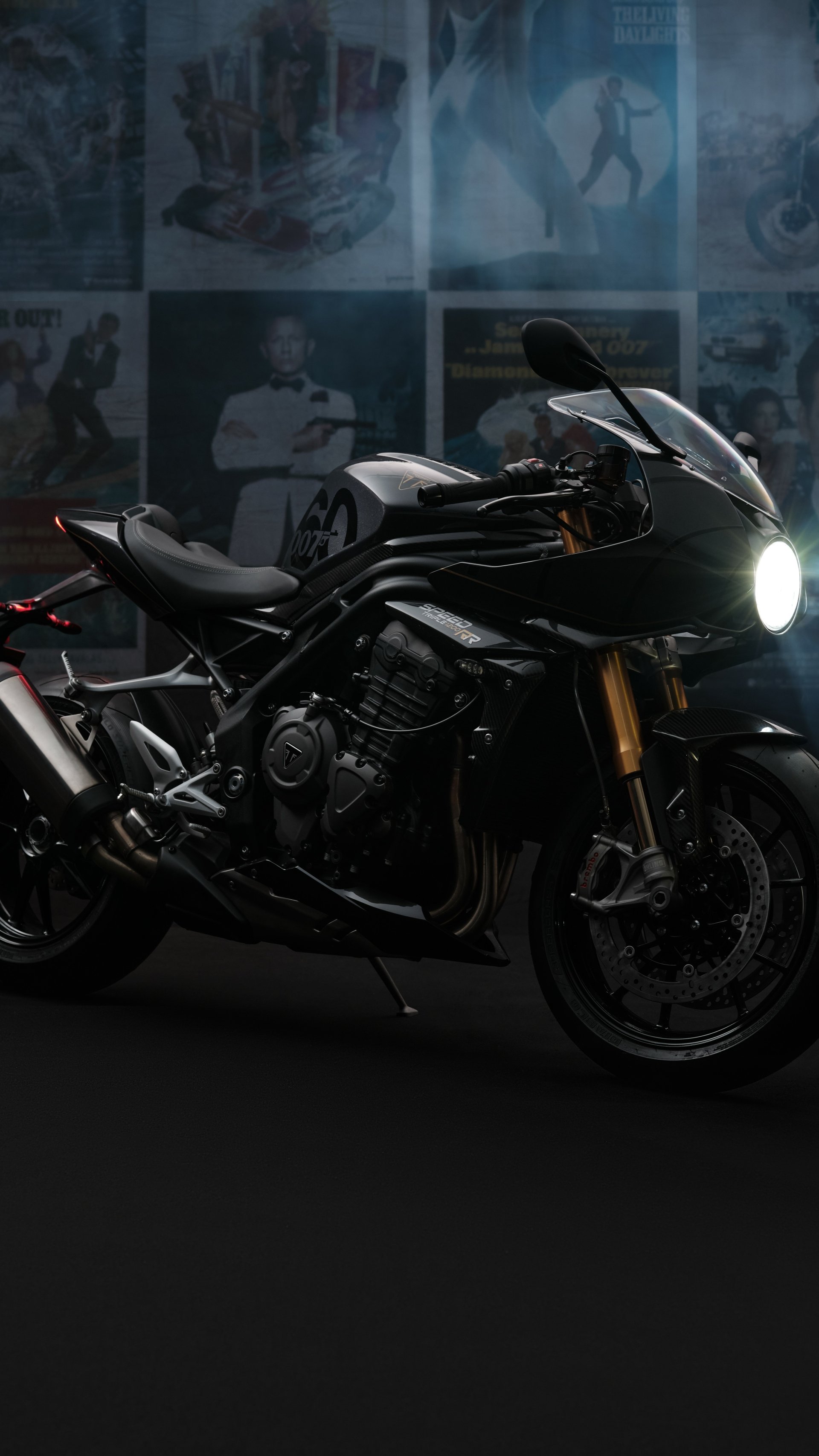 Triumph Speed Triple 1200 RR Bond Edition motorcycle showcased as a phone wallpaper with moody background.