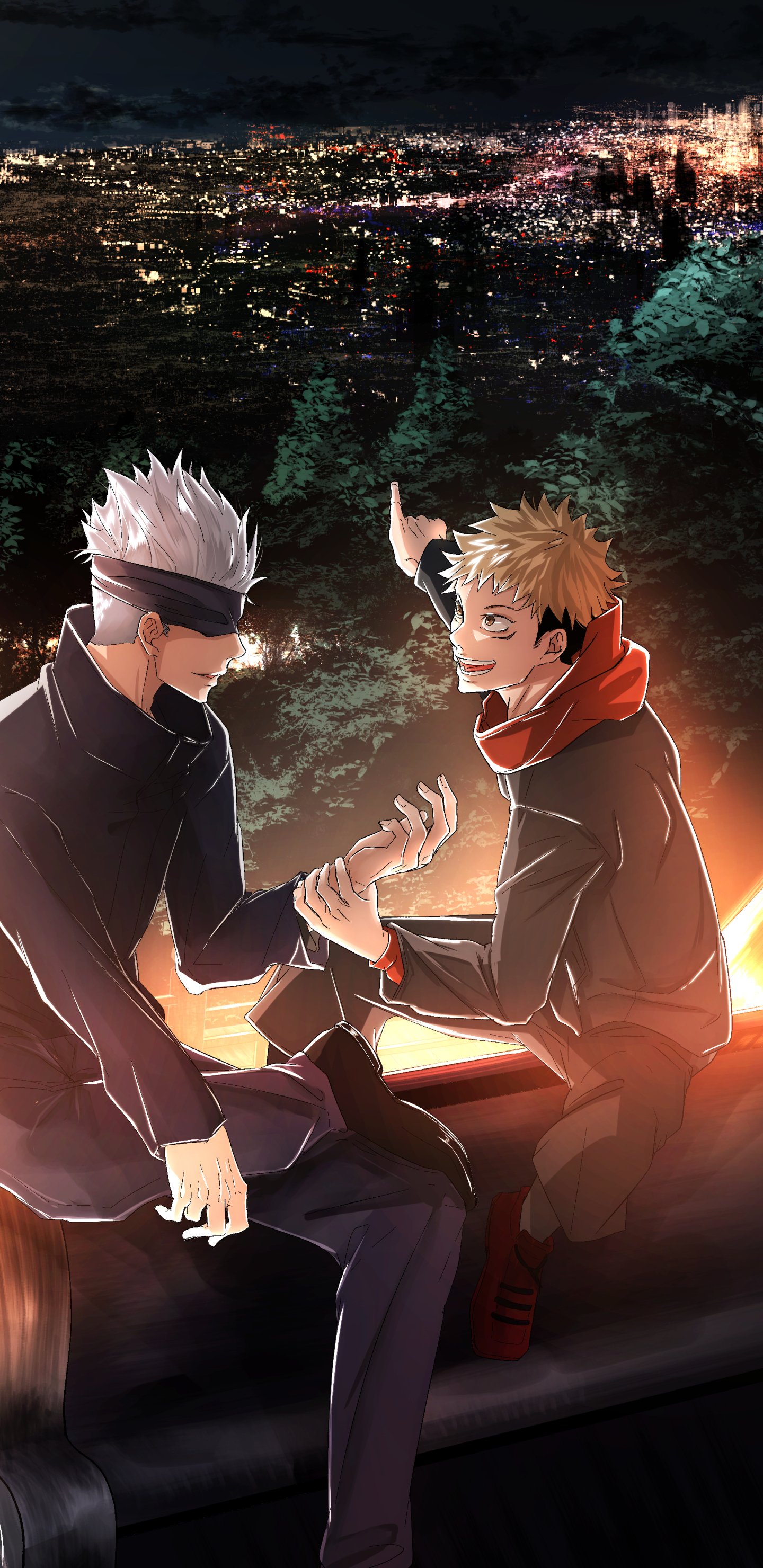 Anime phone wallpaper featuring Yuji Itadori and Satoru Gojo from Jujutsu Kaisen, sitting together with a glowing cityscape at night in the background, designed for iPhone and Android.