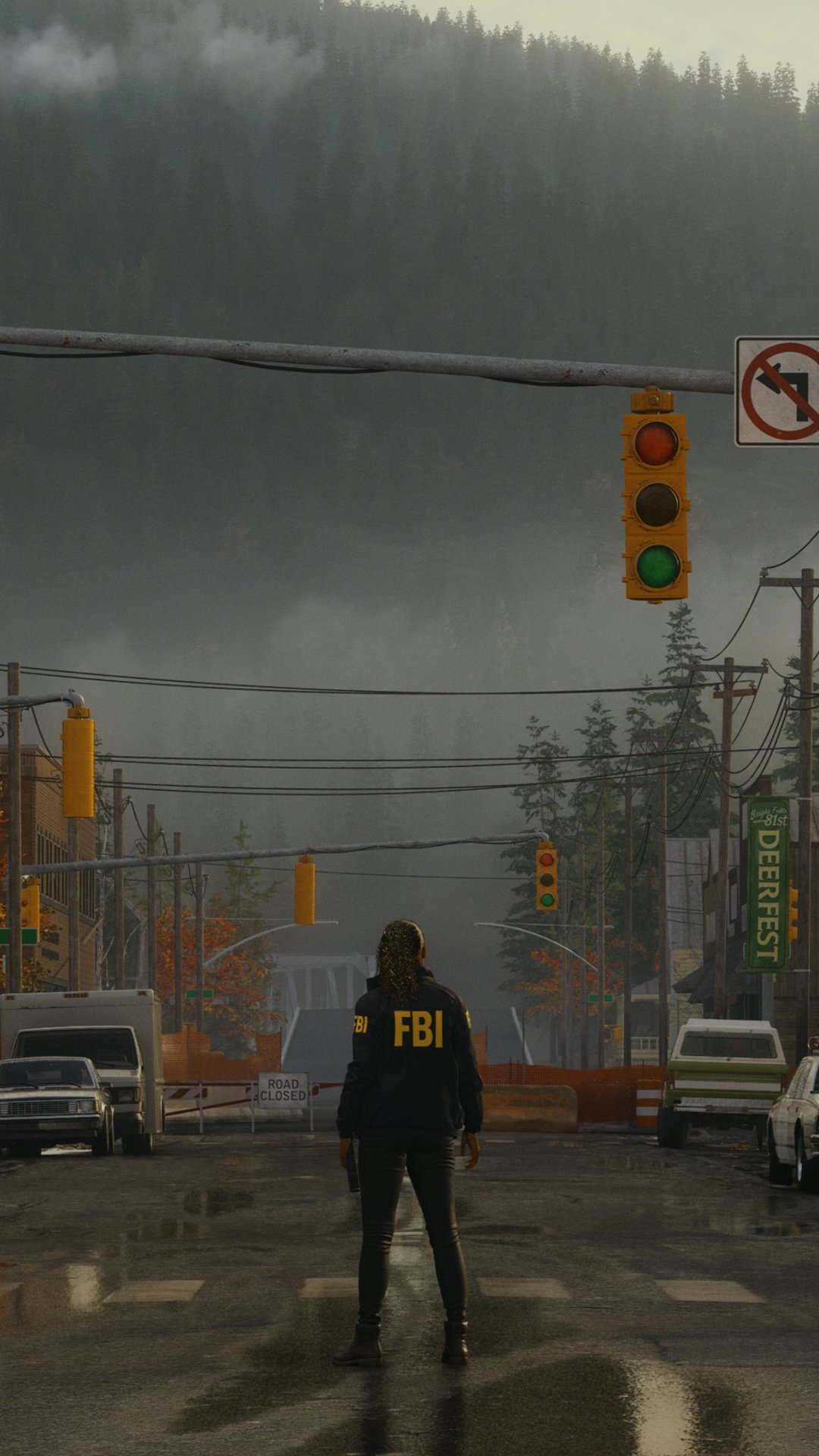 Alan Wake 2 themed phone wallpaper featuring an FBI agent standing in a rainy street with a backdrop of misty forests and traffic lights.