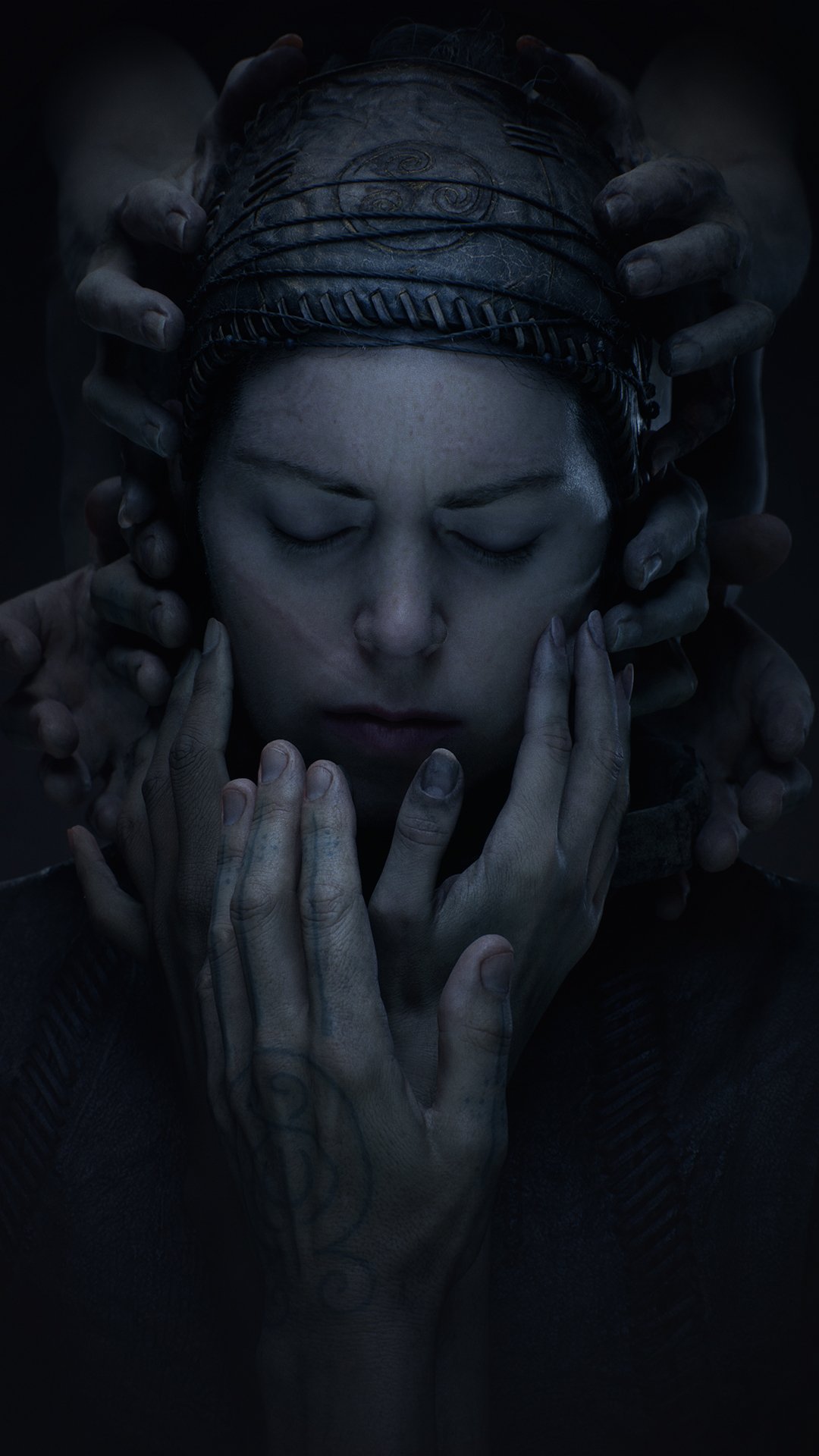 A haunting phone wallpaper from Senua's Saga: Hellblade II, featuring a woman surrounded by shadowy hands, conveying a gripping atmosphere of struggle and emotion.
