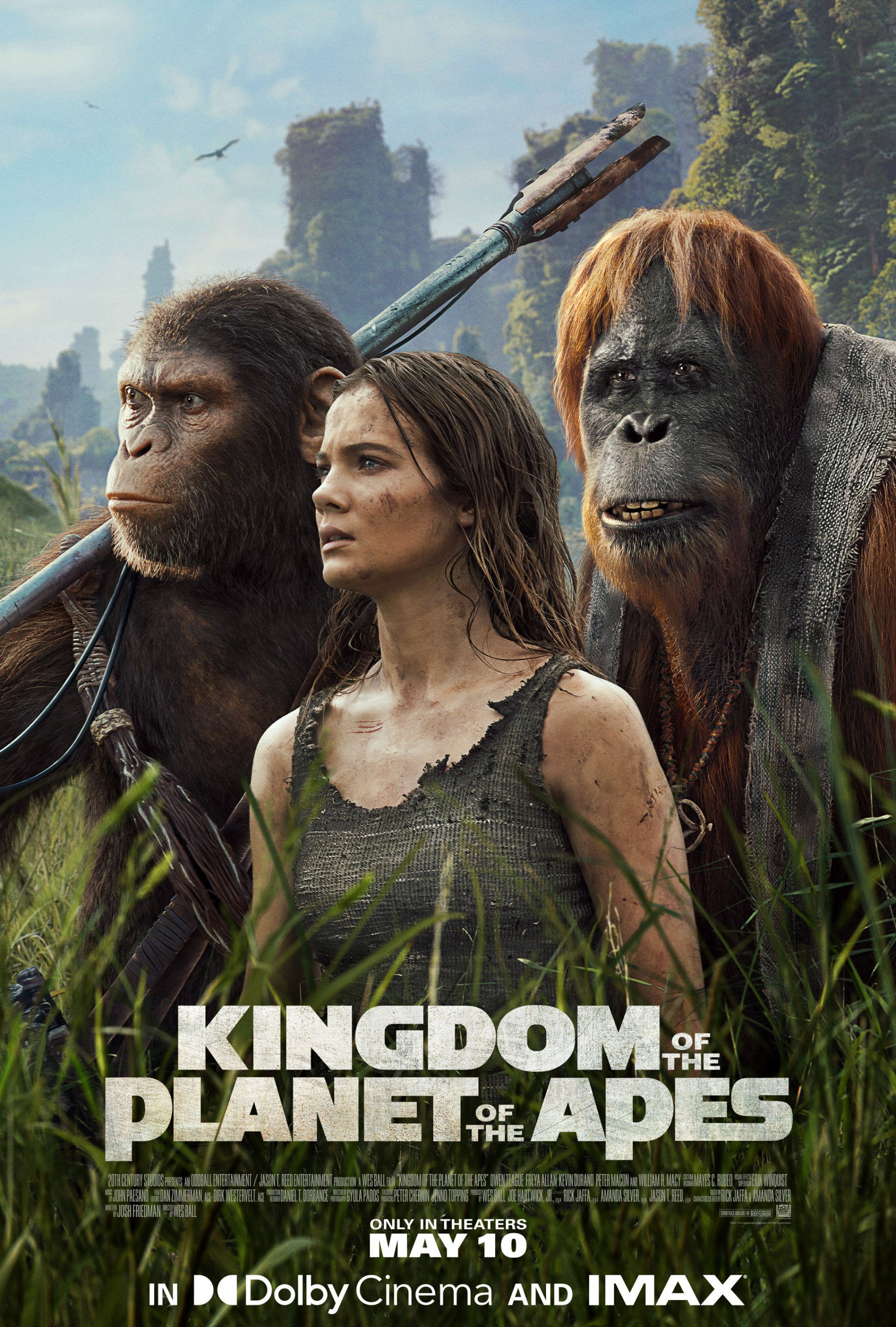 Kingdom of the Planet of the Apes movie wallpaper featuring characters standing ready in a lush landscape, with movie release information.
