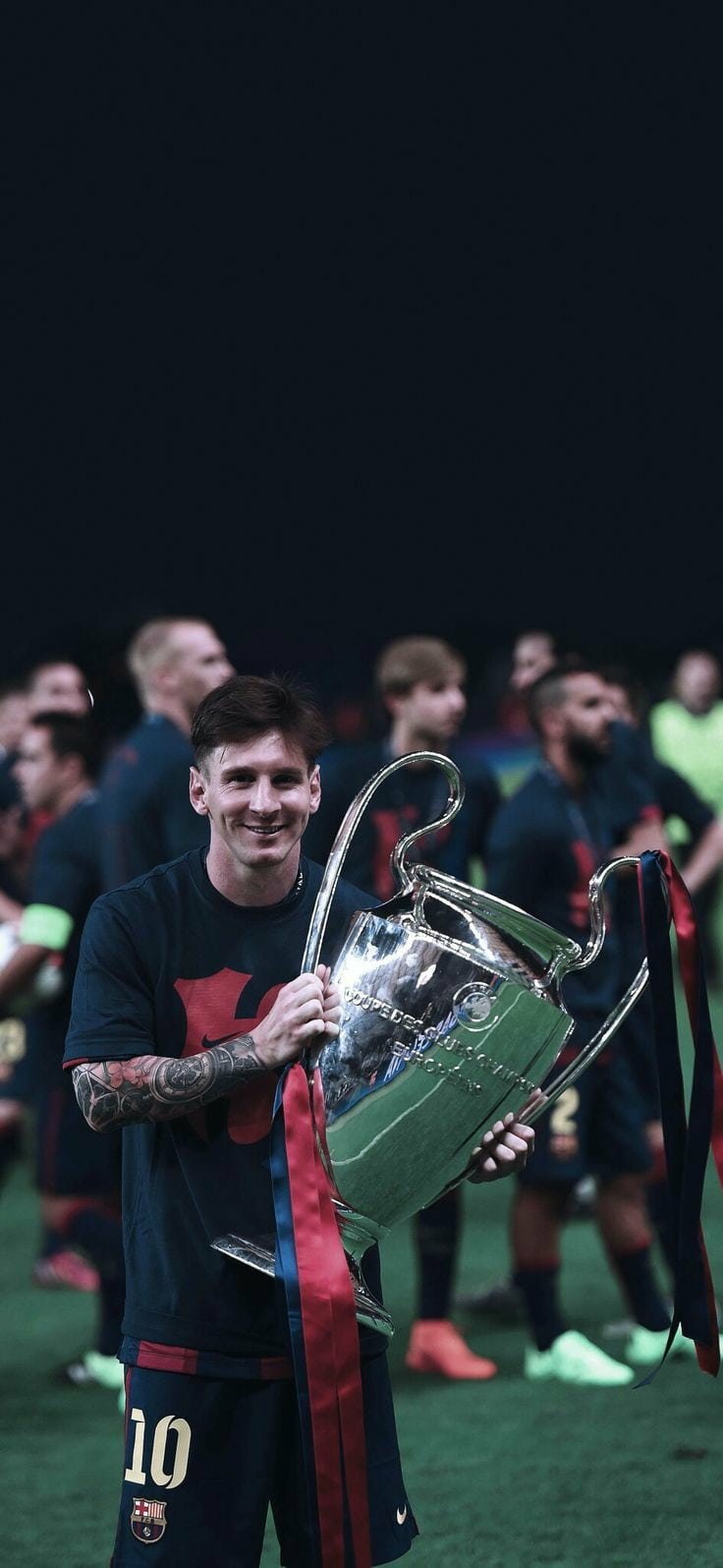 Lionel Messi holding UEFA Champions League Trophy, FC Barcelona themed phone wallpaper.