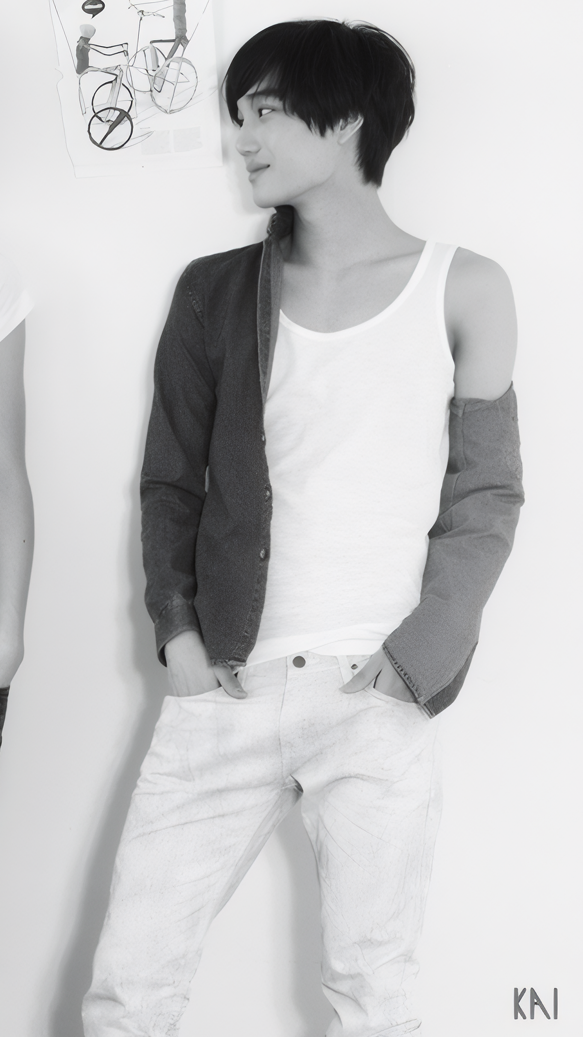 Black and white phone wallpaper of EXO’s Kai from the MAMA photoshoot, wearing a half-shirt and tank top, looking sideways with hands in pockets.
