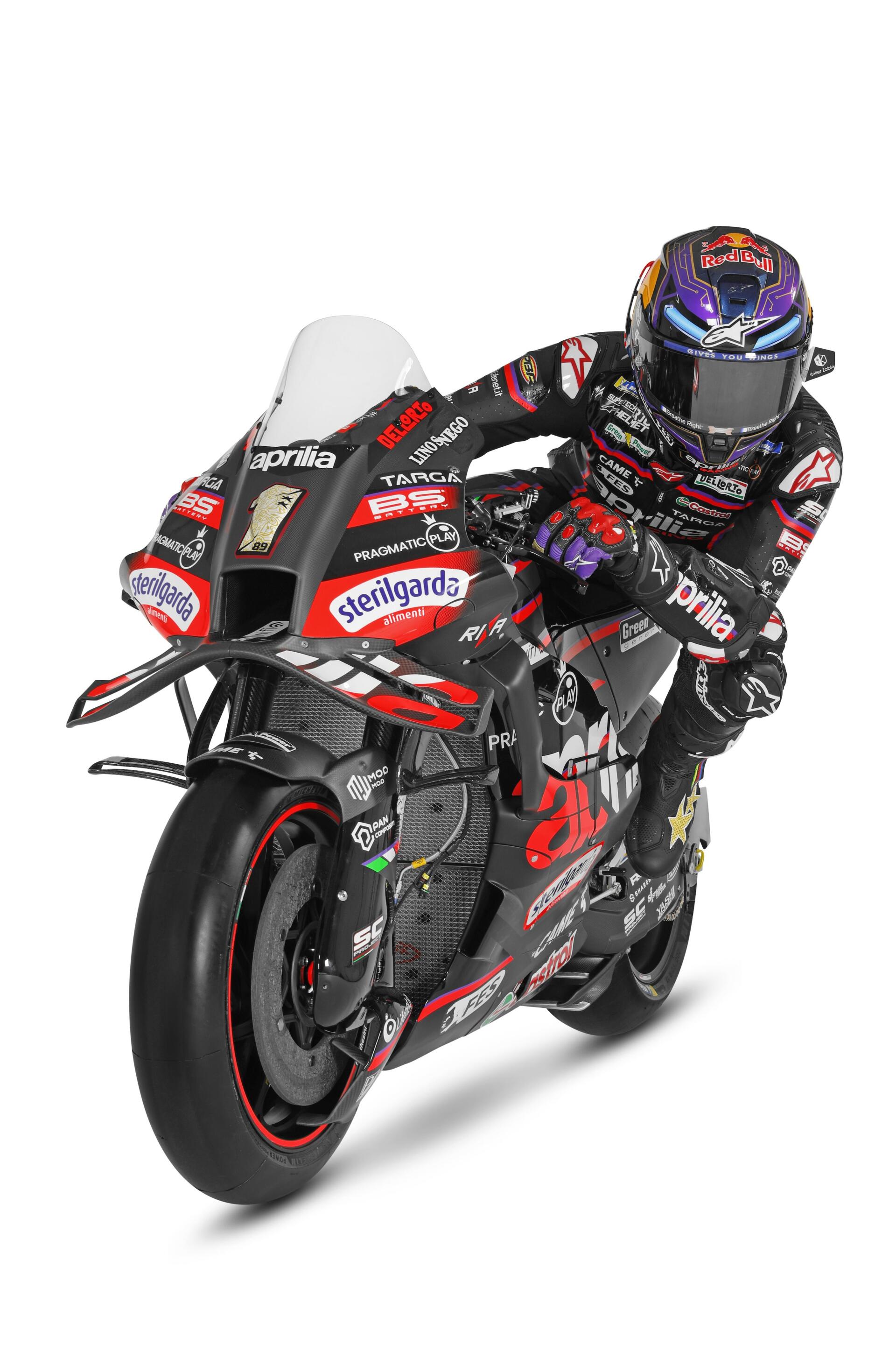A dynamic motorcycle racing image featuring a rider on a sleek MotoGP bike, showcasing the excitement and speed of the sport, designed as a vibrant phone wallpaper.