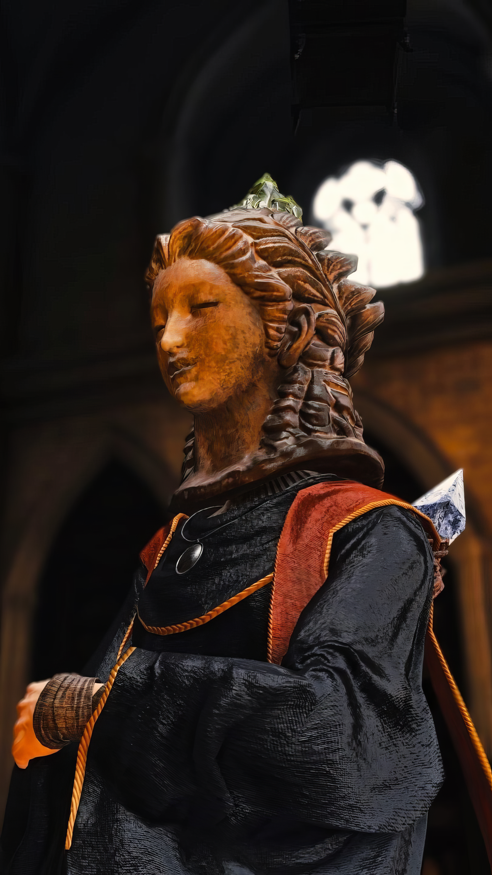 A detailed depiction of a character from Elden Ring, featuring ornate clothing and a crown. The background hints at a mystical setting, making it an engaging phone wallpaper.