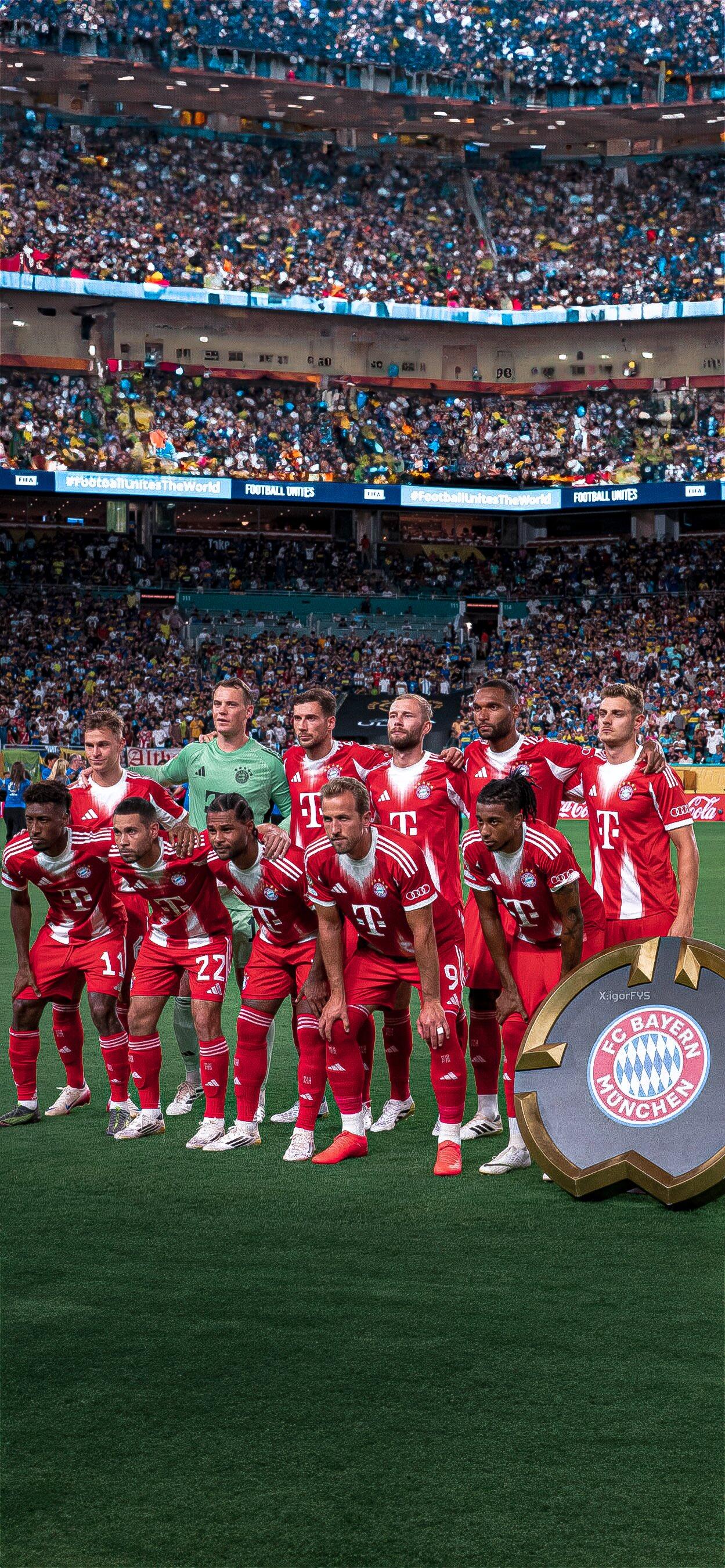 FC Bayern Munich soccer team poses on the field during the FIFA Club World Cup, captured in a vibrant stadium packed with fans.
