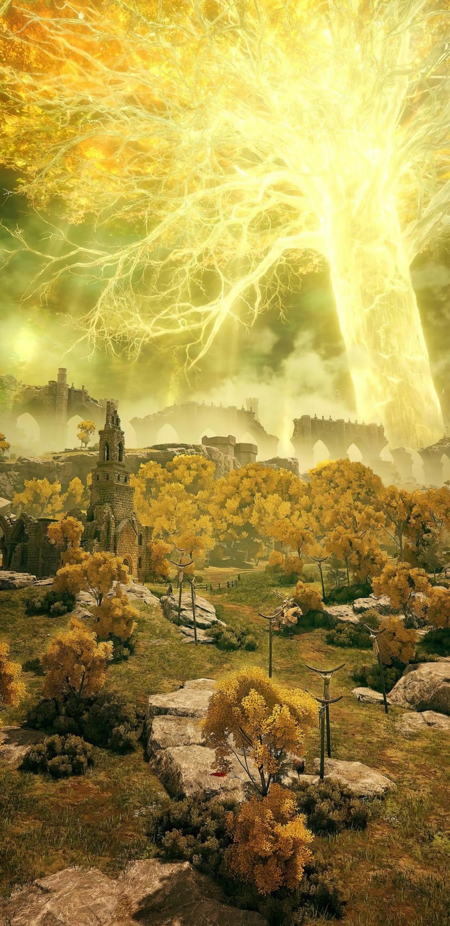 Elden Ring phone wallpaper: towering glowing golden tree above yellow autumn woods and ruined castle, vertical gaming environment formatted for iPhone and Android devices.