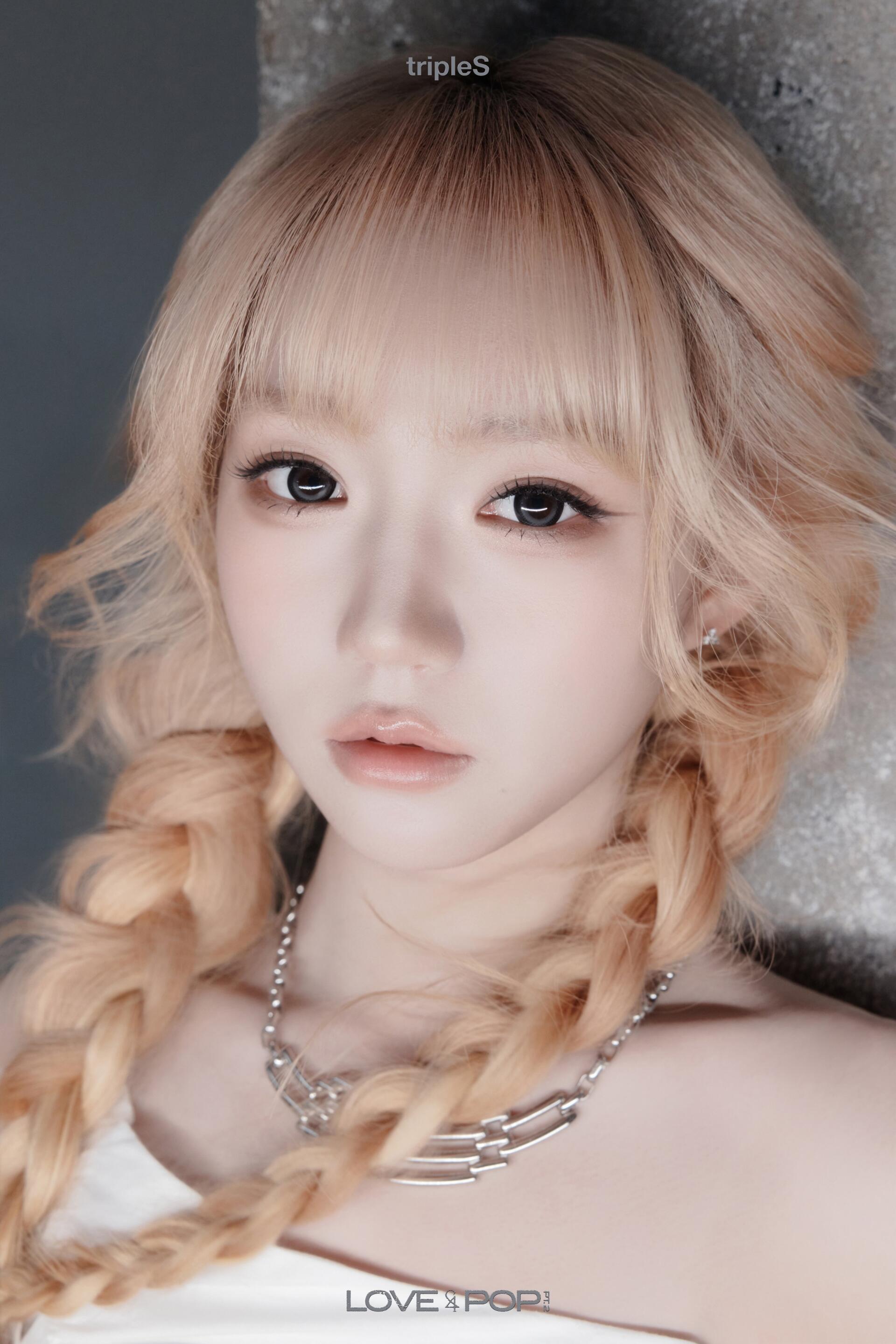 tripleS ShiOn Andless portrait iPhone wallpaper, close-up of a woman with blonde braided hair and soft makeup