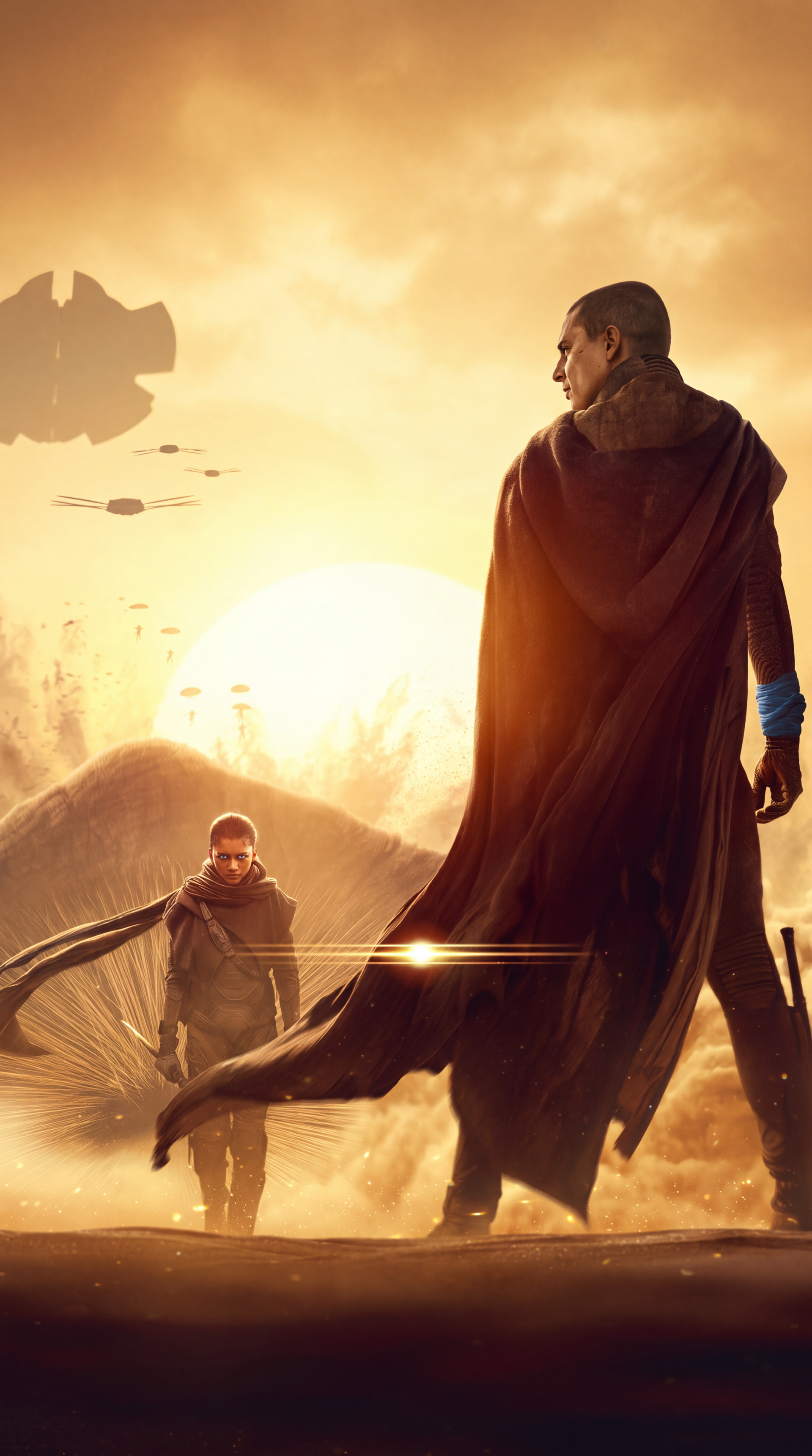 Dune: Part Three iPhone wallpaper featuring Timothée Chalamet as a cloaked man in a glowing desert, with Zendaya among the film’s stars.