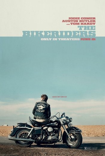Phone wallpaper featuring a scene from the movie The Bikeriders with a character sitting on a motorcycle against a vast, open sky background. The text highlights the cast and the release date.