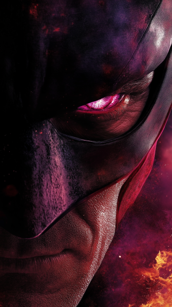 Close-up phone wallpaper of Marvel's X-Men Magneto, showcasing intense glowing eyes and detailed helmet, designed for iPhone and Android displays.