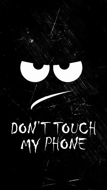 Black grunge phone wallpaper with angry white cartoon eyes and scowl above handwritten text DON'T TOUCH MY PHONE, made for iPhone and Android screens.