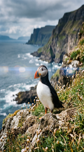 Vertical iPhone wallpaper of a puffin perched on grassy coastal cliffs with waves and distant rocky headlands beneath a dramatic cloudy sky.