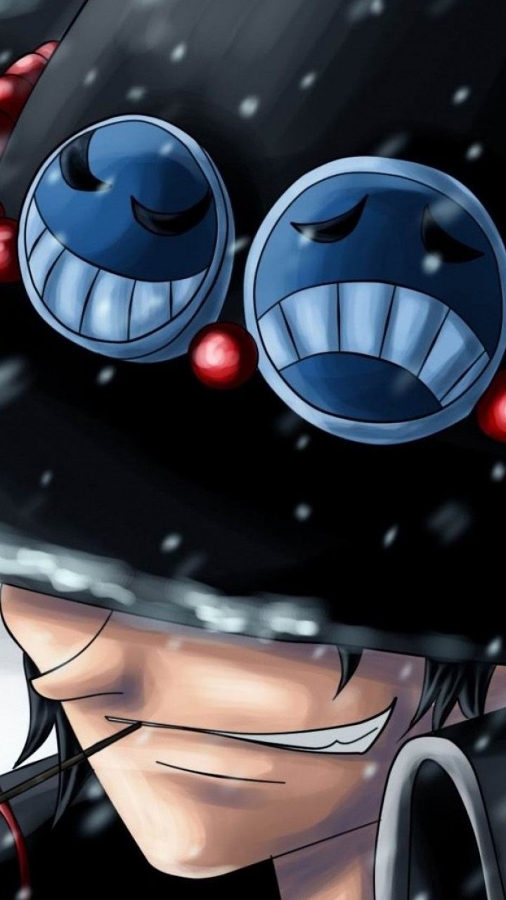Phone wallpaper of Portgas D. Ace (One Piece): close-up anime portrait, crooked grin beneath a beaded hat adorned with two blue smiley pins.