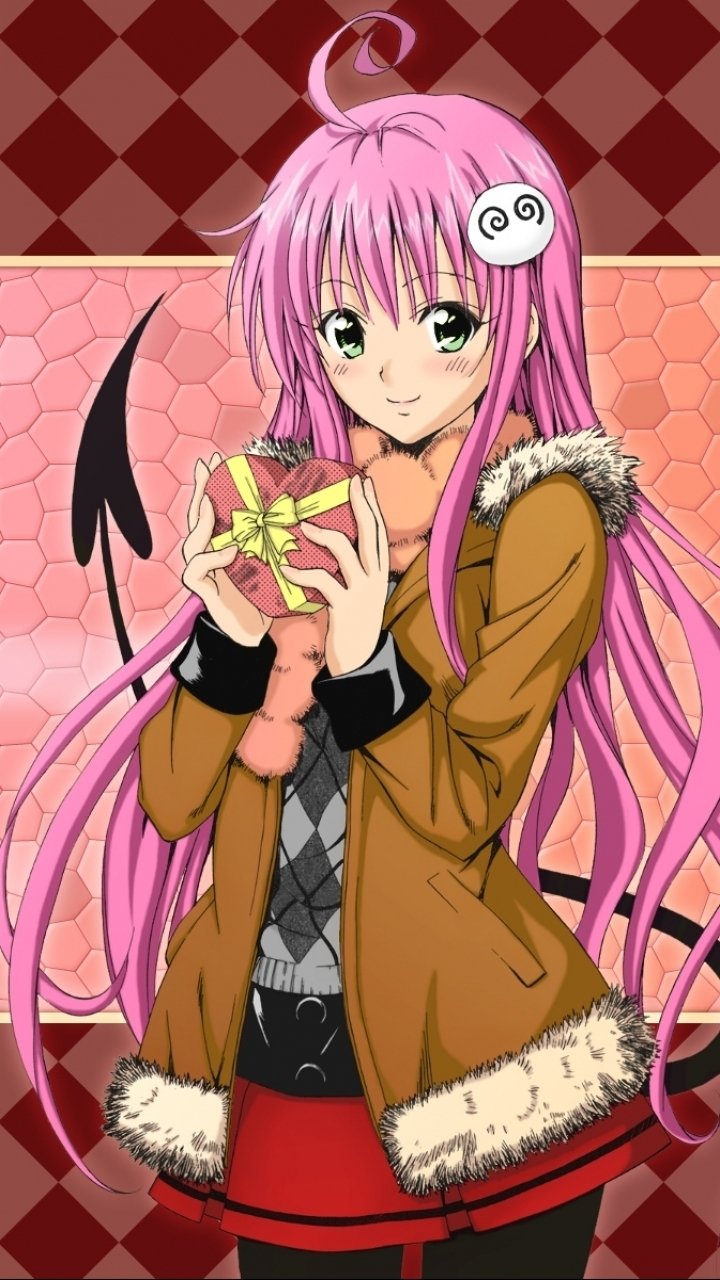 Lala Satalin Deviluke from To Love-Ru as a phone wallpaper: pink-haired girl in a fur-trimmed brown coat holding a yellow gift, smiling with a devil tail against a red diamond background.