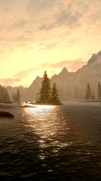 Phone wallpaper from the video game The Elder Scrolls V: Skyrim: a golden sunset over a mountain lake, pine isles and snowy peaks reflected in rippling water.