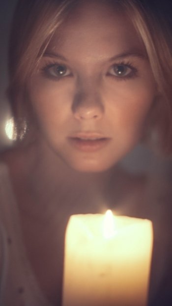 bokeh blonde candle woman model Phone Wallpaper