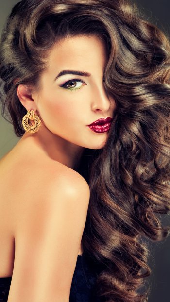  Beautiful model brunette with long curled hair by Eduard Derule