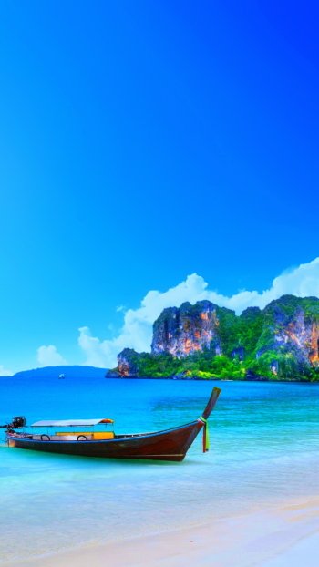  Long-Tail Boat on Beach in Thailand