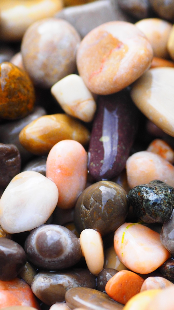 Photo of small colorful pebbles by Hans Braxmeier