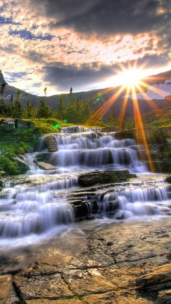 mountain sun sunrise stream nature waterfall Phone Wallpaper