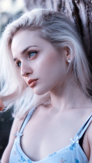depth of field mood blue eyes blonde woman model Phone Wallpaper