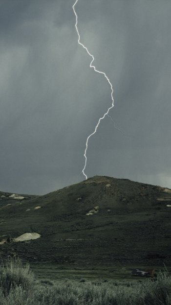 sky landscape grass hill photography lightning Phone Wallpaper
