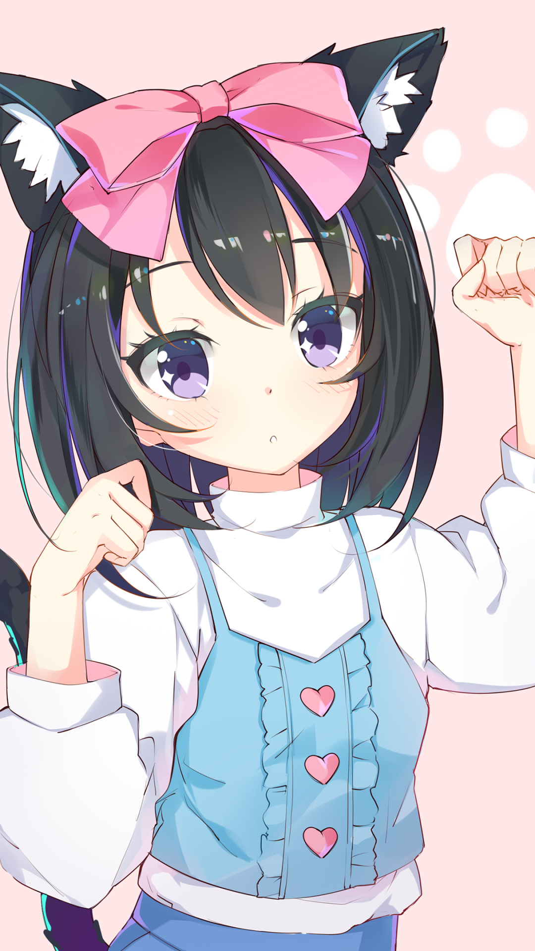 Phone wallpaper featuring an anime girl with cat ears: black hair, purple eyes, big pink bow, blue dress with heart buttons over a white blouse, pastel pink background, posing with playful raised fists.