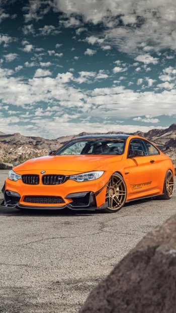 orange car vehicle car BMW BMW M4 Phone Wallpaper