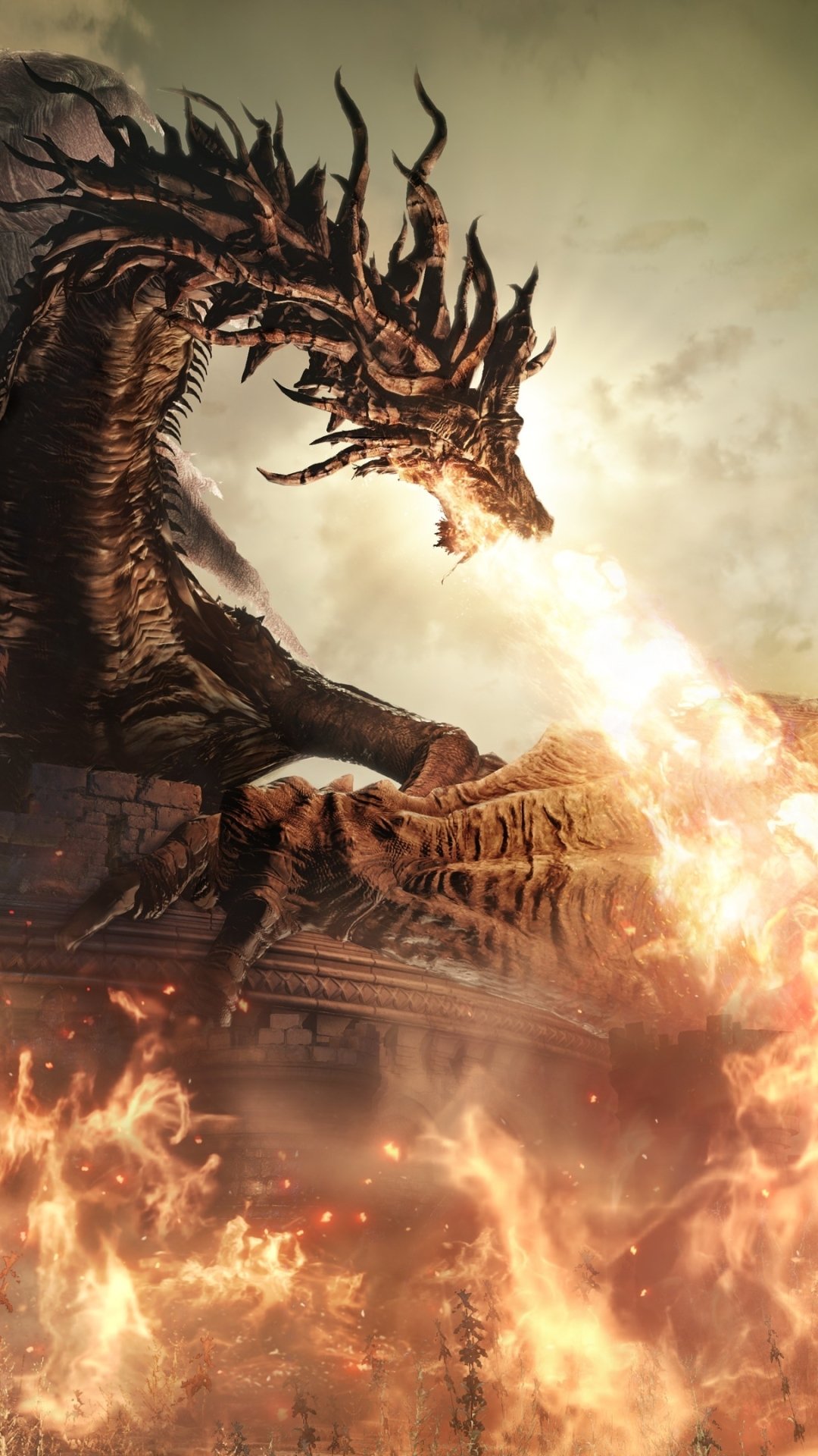Phone wallpaper of a colossal dragon unleashing flames over a burning ruined city — Dark Souls III video game art.