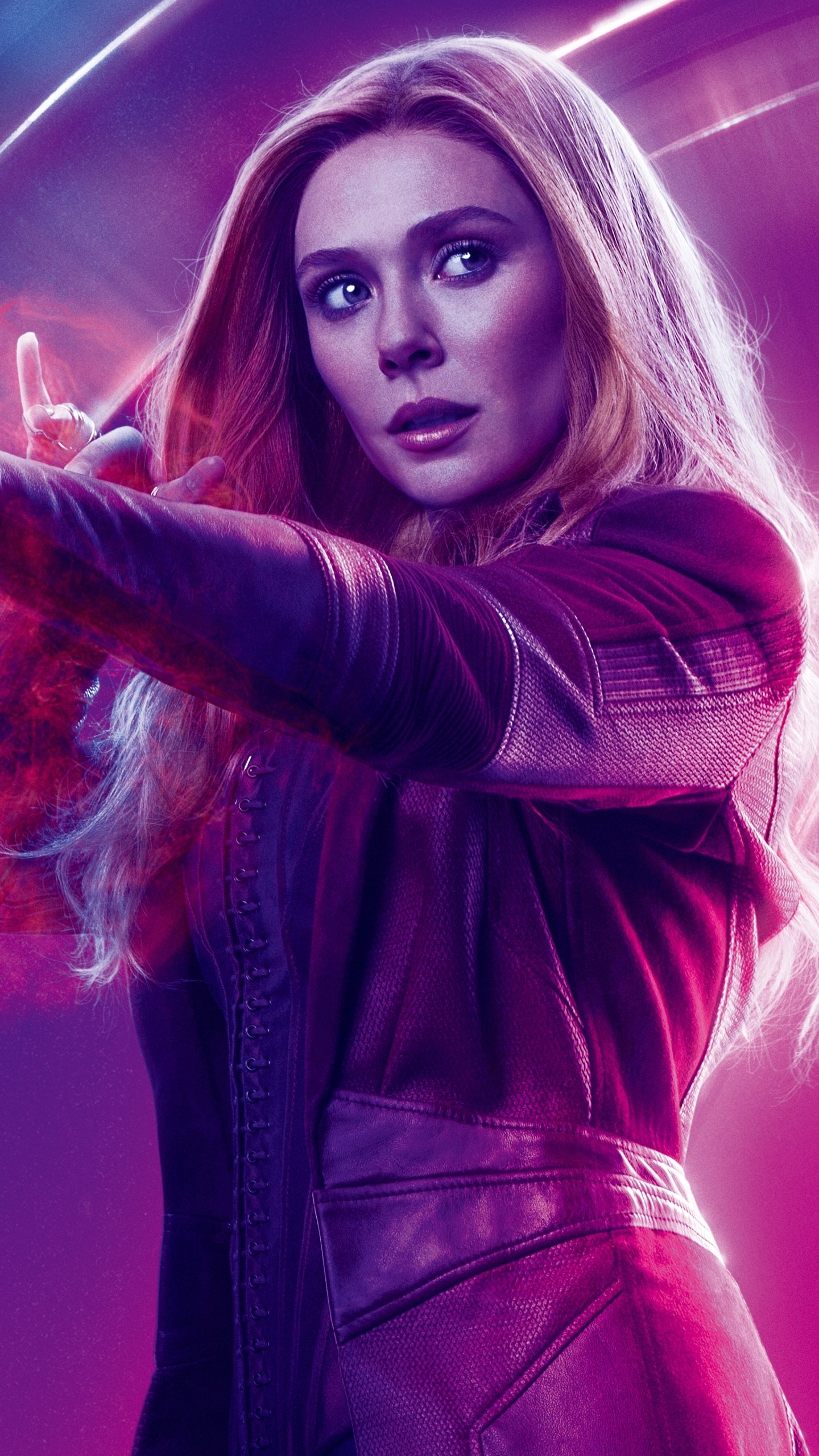 Phone wallpaper: Scarlet Witch (Avengers: Infinity War) — cinematic portrait of a red‑clad sorceress in a leather jacket, arms raised as purple energy swirls around her.
