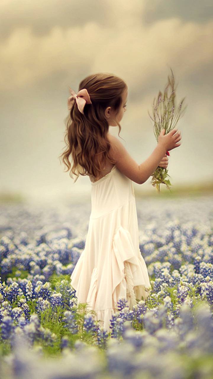 Little Girl in Flower Field