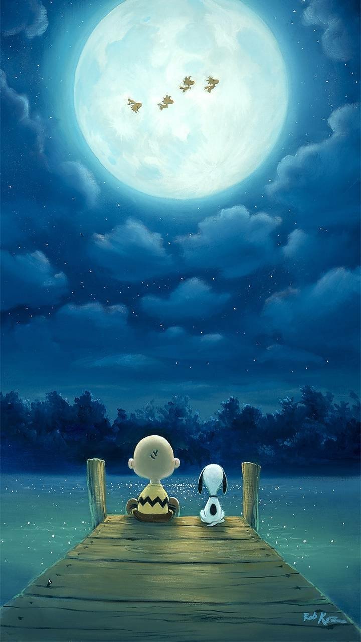 Phone wallpaper of Charlie Brown and Snoopy sitting on a wooden pier beneath a huge glowing moon, Peanuts-style night sky with stars and birds flying across the moon.