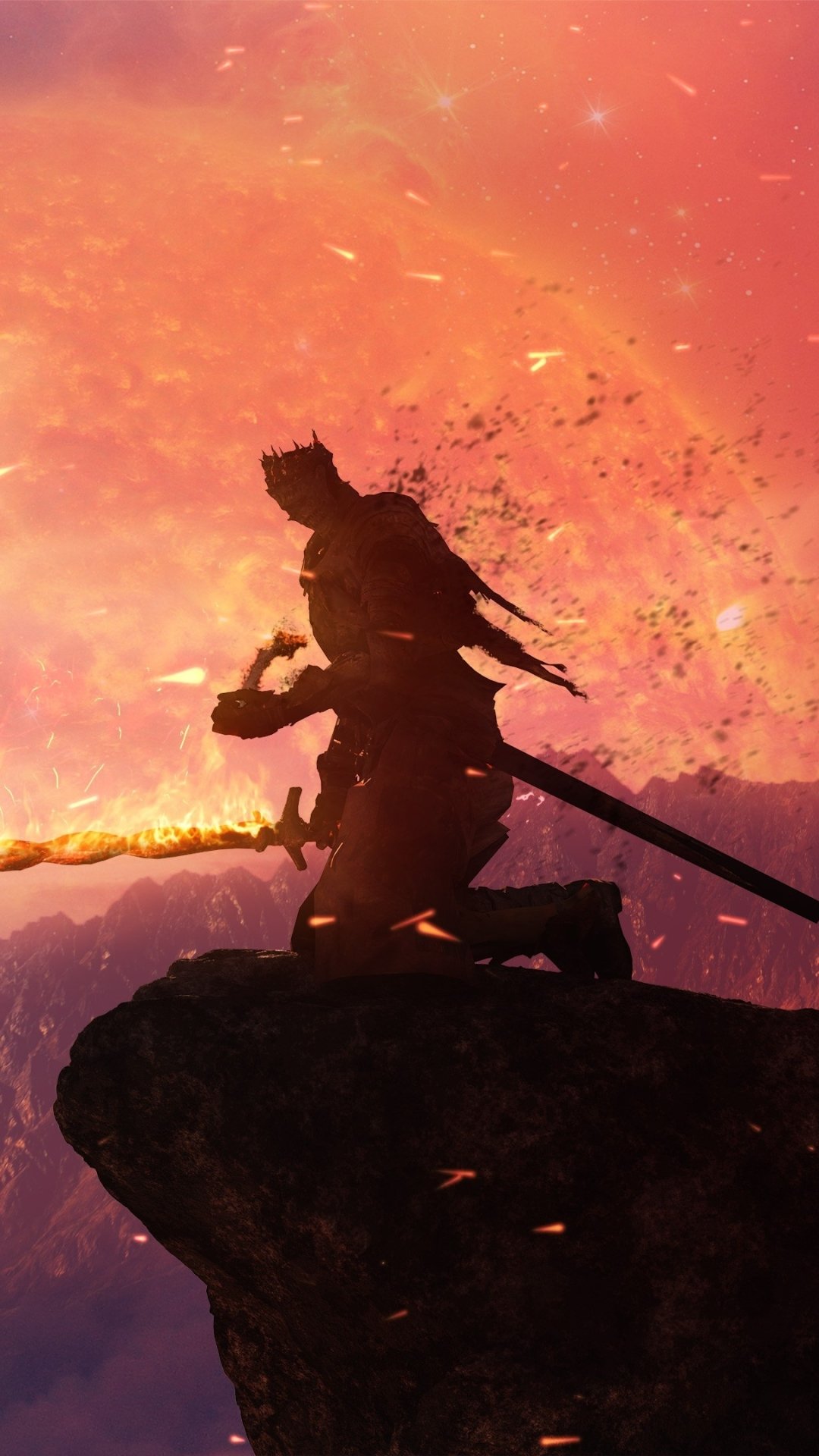 Silhouetted Dark Souls video game warrior kneels on a rocky ledge, sword driven into the ground against a blazing orange sky, framed as a dramatic phone wallpaper