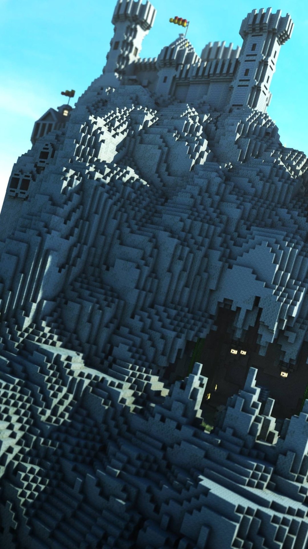 Minecraft-themed phone wallpaper featuring a detailed blocky castle atop a rocky mountain, designed for iPhone and Android displays.