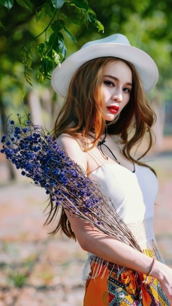 brunette bouquet depth of field hat lipstick model woman asian Phone Wallpaper
