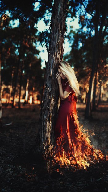 fire depth of field forest red dress blonde photography manipulation Phone Wallpaper