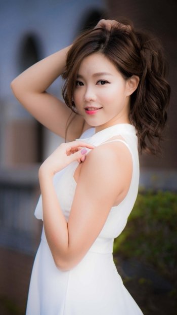 white dress smile brunette model woman asian Phone Wallpaper