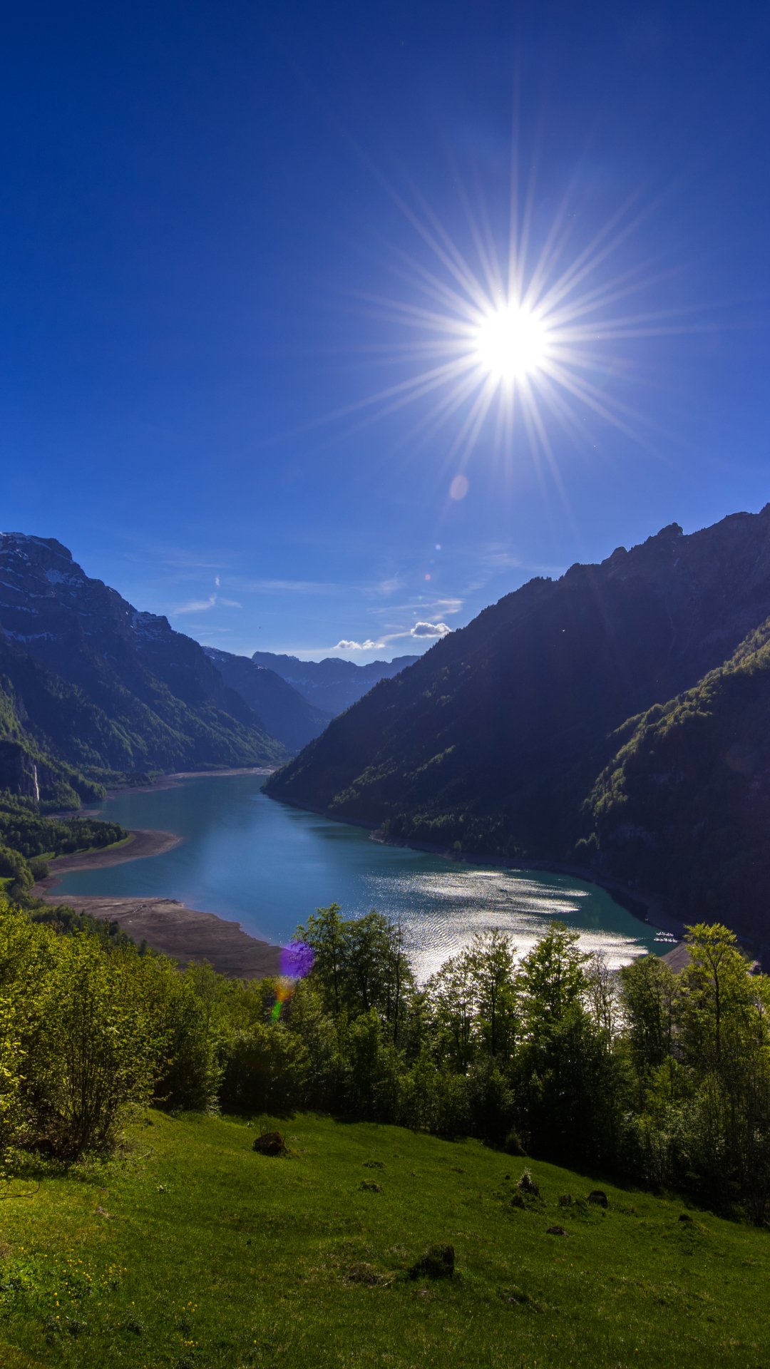 Download Switzerland Lake Sun Mountain Nature Landscape Phone Wallpaper