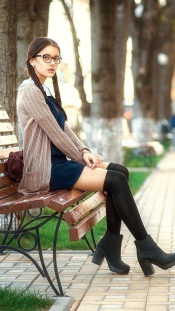 braid brunette depth of field bench woman model Phone Wallpaper