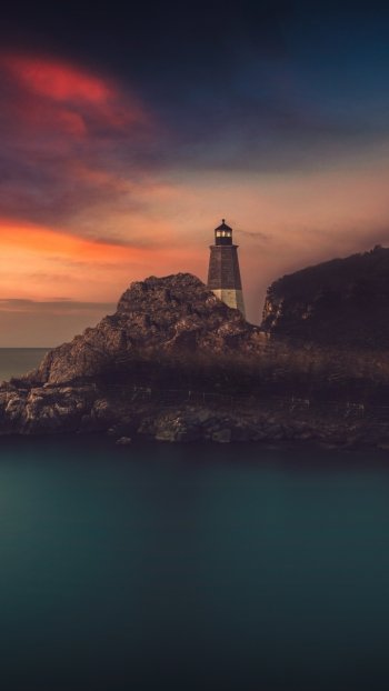 sky coast horizon ocean man made lighthouse Phone Wallpaper