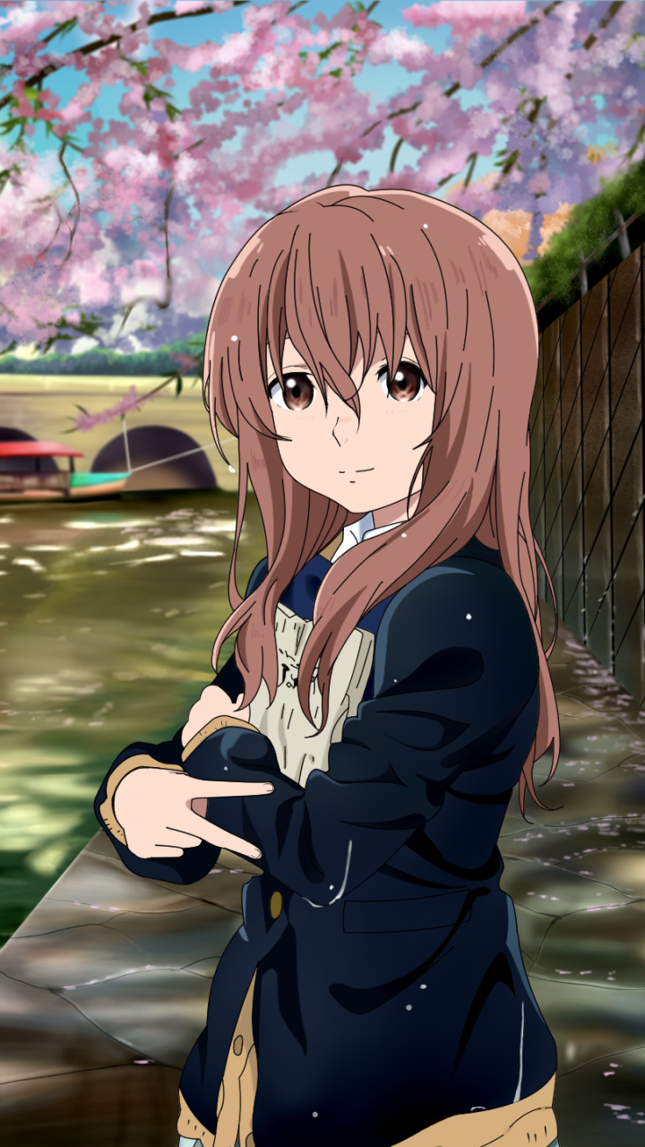 Phone wallpaper of Shouko Nishimiya from A Silent Voice: anime portrait in a school uniform under cherry blossoms by a canal, with a gentle, calm smile.