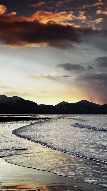 cloud sky ocean sunrise scenic landscape wave beach mountain sea evening nature coastline Phone Wallpaper