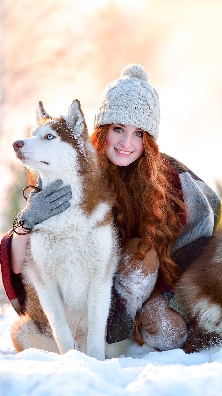 Download Hat Husky Dog Snow Winter Smile Redhead Woman Mood Phone Wallpaper