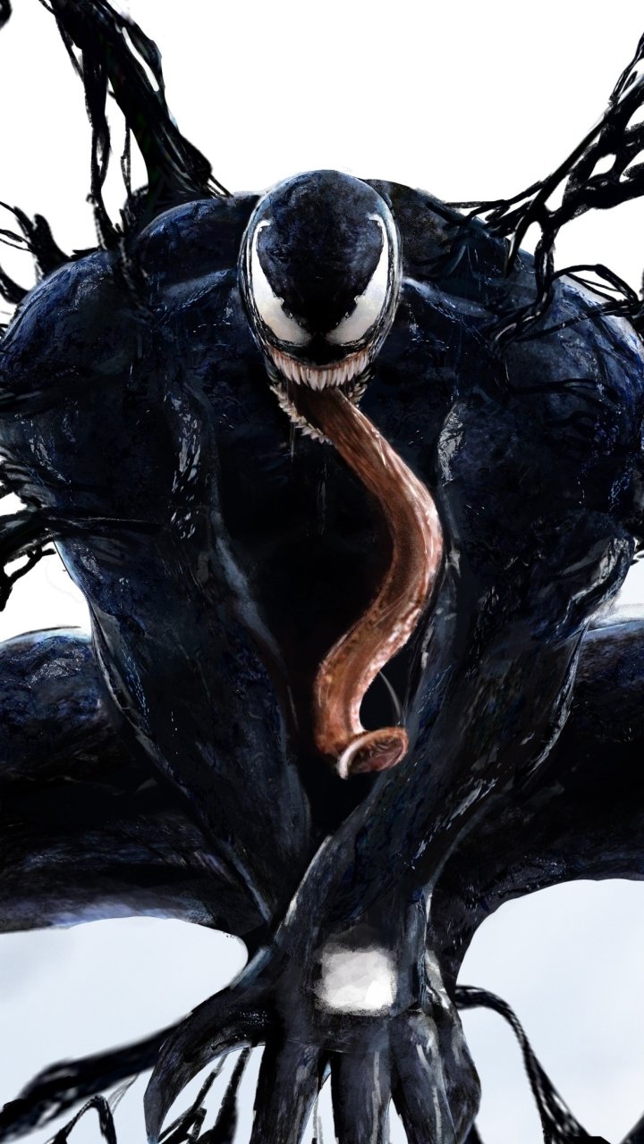 Phone wallpaper of Venom (movie): crouched black symbiote with white eyes and chest emblem, writhing tendrils and a long tongue against a pale background.