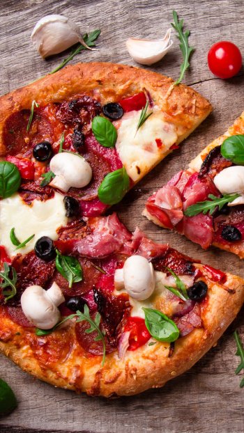  Italian Pizza with salami, mozzarella and olives for lunch or dinner