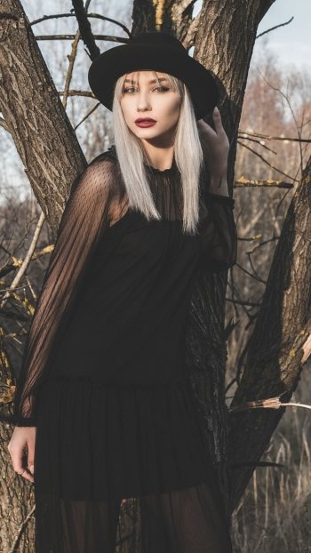 white hair hat black dress lipstick woman model Phone Wallpaper
