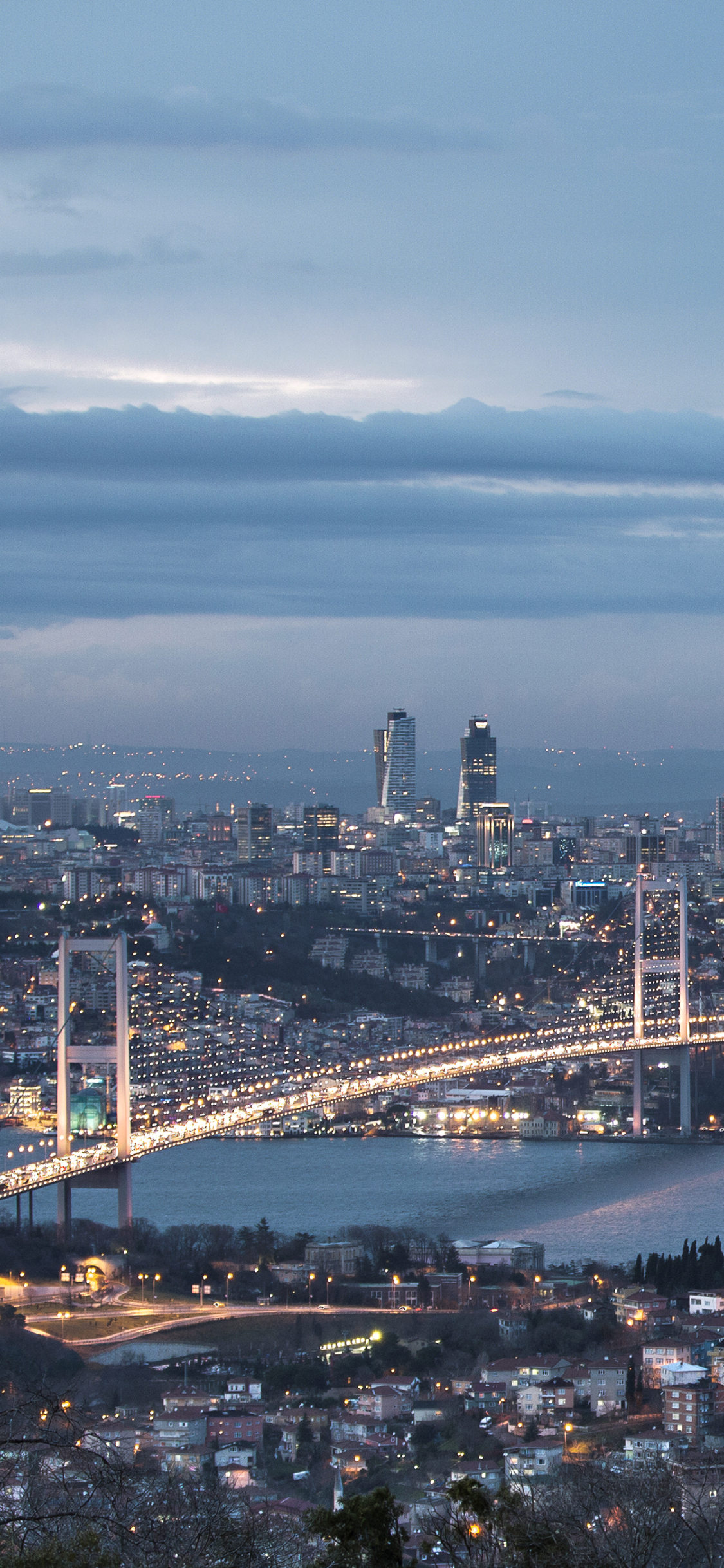 Bosphorus and bridge at night by ihsan Gercelman